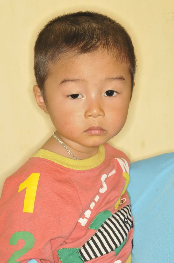 Young boy in a colorful shirt